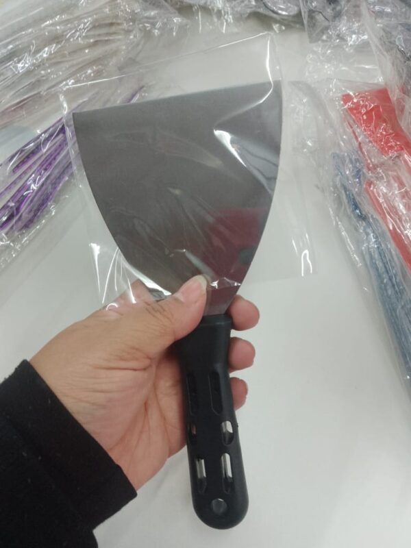 Espátula de metal